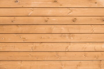 Background from wooden boards in light beige color.