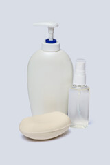 Fototapeta na wymiar group of hand sanitizer spray and liquid soap bottles isolated on white background