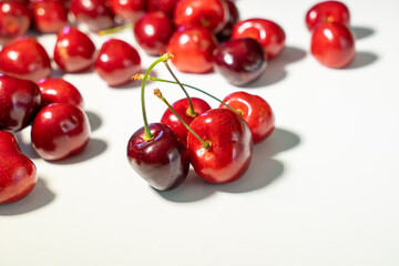 Fresh cherries on a white background