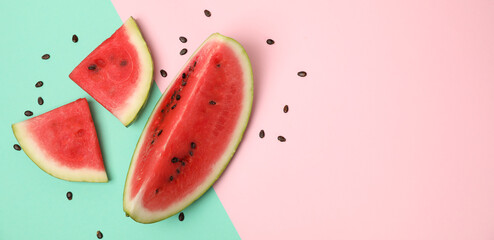 Composition with watermelon slices on two tone background, top view