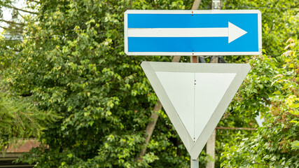 black and white road sign give way