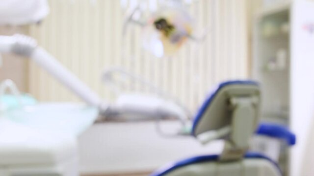 Authentic dentist office blurred background. Dental doctor cabinet. Out of focus shot.