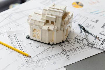 Tools and papers with sketches on the table