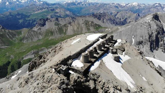 Mount Chaberton aerial view from airplane, peak of mountain in the Cottian Alps located in the French department of the Hautes-Alpes with forts battery on the top.
