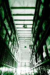 Warehouse cargo building store, warehouse interior with shelves, pallets and boxes for stock and sorting shipment goods in freight, logistics and transportation industrial