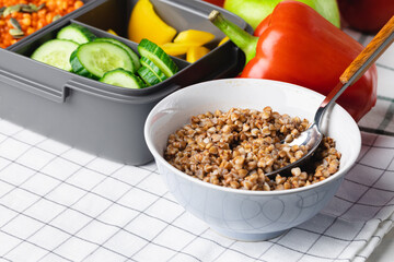 Close up photo of plastic lunch box with cooked food