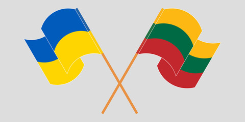 Crossed and waving flags of the Ukraine and Lithuania