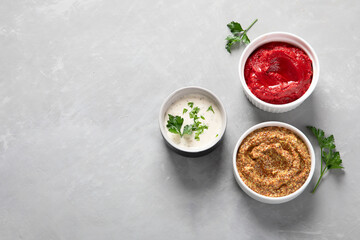 Set of various sauces in bowls