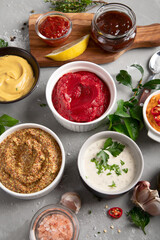 Set of various sauces in bowls