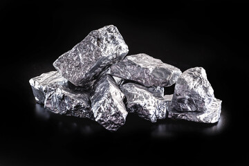 silver nugget native to Liberia isolated on black background. Rare stone for industrial extraction ore