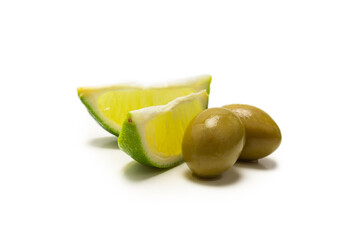 Two olives and piece of lemon and lime isolated on white