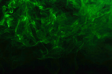Green steam on a black background.