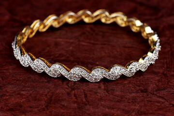 Diamond bracelet on textured background, diamond jewellery, diamond bangles,diamond jewelry
