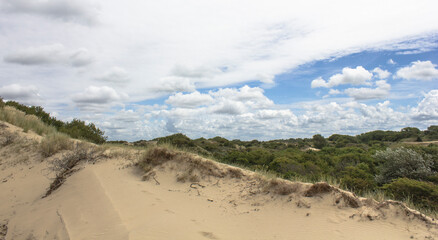 sand dunes and clouds