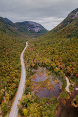 An aerial panorama of Crawford Notch State Park with a distant Mount Willard.