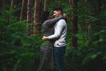 married couple in forest