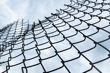 mesh fence against the sky