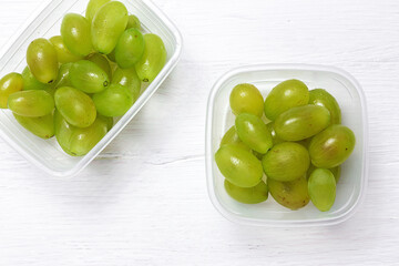 Fresh seasonal grapes in Plastic containers ready to eat To take away