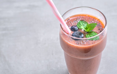 Red smoothie dessert in glasses. Healthy appetizing