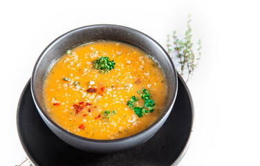 Delicious vegetable potato soup served in a bowl