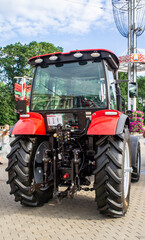 Agricultural machinery tractor close-up. Mechanics and hydraulics. 07 July 2020, Minsk Belarus