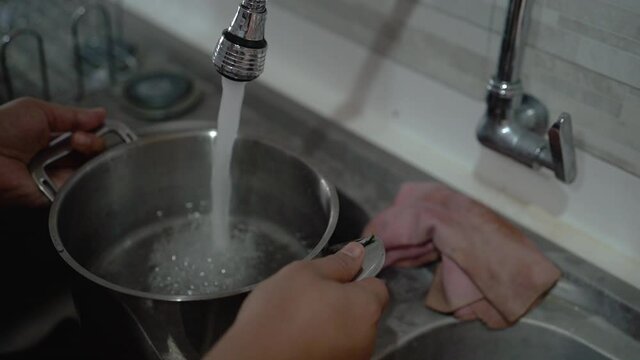filling the pan with tap water before cooking