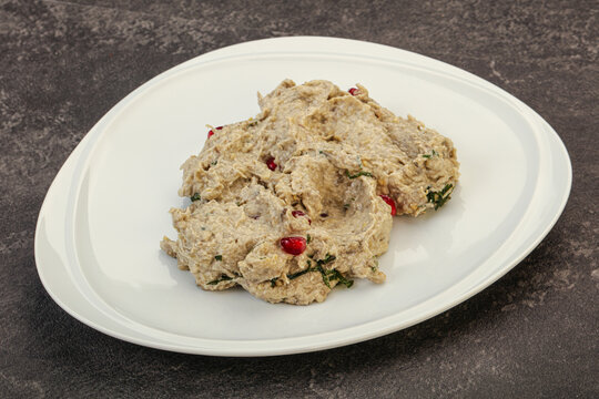 Vagan dietary cusine - mutabal with granet seeds