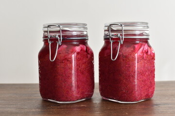 homemade red cabbage sauerkraut in glass container