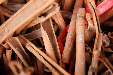Closeup of cinnamon sticks at outdoor market stall