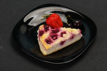Cheesecake with cherry served strawberry
