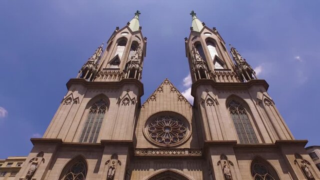Fast approaching to Sao Paulo catholic cathedral, city landmark on sunny day, Brazil