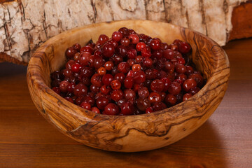 Traditional soaked cowberry in the bowl