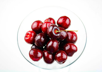 Fototapeta premium Freshly Washed Cherries in a Martini Glass