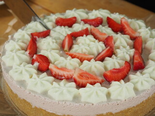 cake with fresh strawberries and cream. decoration with fruit