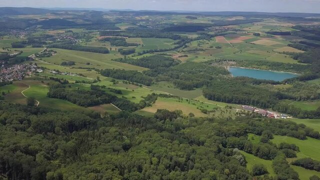 Aerial view on the lake Binningen in Hegau from the Hegau volcanic cone Hohenstoffeln, Germany.