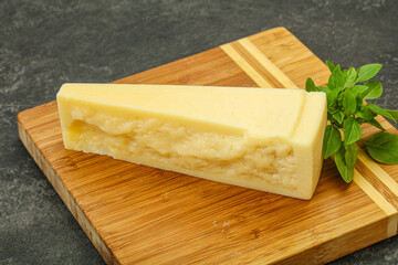 Hard parmesan cheese served basil