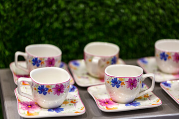 Luxury white ceramic plates on a table is the background selective focus and shallow depth of field

