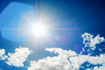 Naklejka na ściany i meble Shining sun at clear blue sky