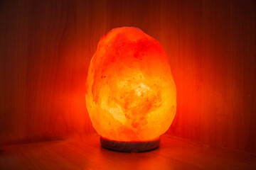 Salt lamp orange color, the ceiling is made of natural crystal rock salt, affects as a tonic...