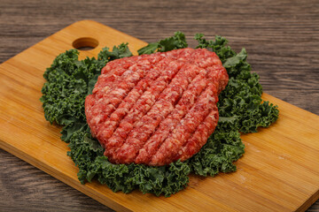 Raw beef burger cutlet for cooking