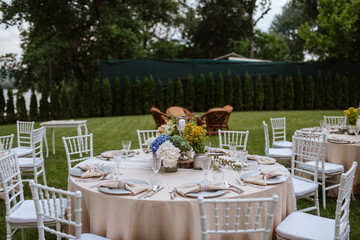 Beautiful pastel floral decoration for outdoor celebration by the river