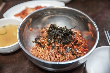Closeup shot of a bowl with Korean spicy food