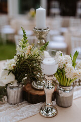 Beautiful pastel floral decoration for outdoor celebration by the river