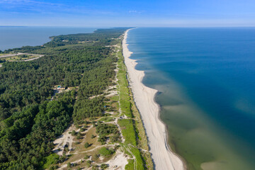 Beautiful view from the top of the Baltic (Vislin) spit. The sandy beach washed by the Baltic sea goes into the distance. Shot on a drone.
