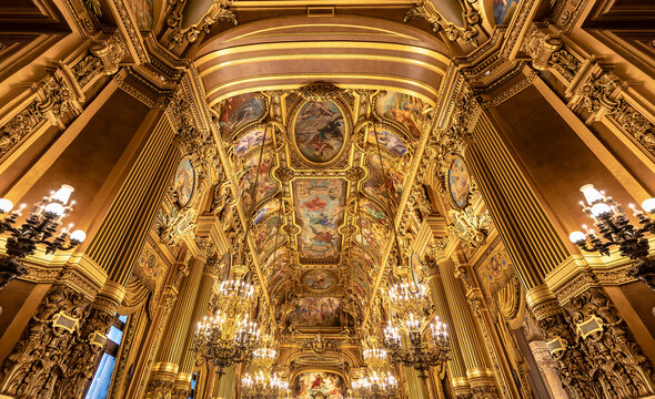 Paris, France - March 17, 2018: View of chandeliers inside of the Palais Garnier (Opera Garnier) in Paris, France. It was originally called the Salle des Capucines