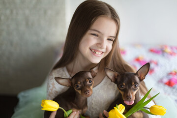 Girl with flowers and dogs