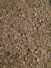 Wall of small stones with abstract masonry.