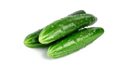 group of a fresh tasty cucumbers isolated on white background.
