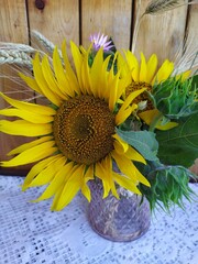 Beautiful delicate yellow bouquet of sunflowers ib a vase