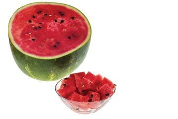 Close up view of  whole and diced watermelon on white background. 